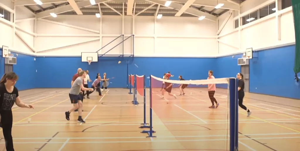 People playing a game of badminton