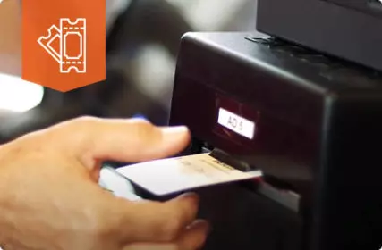 Person Entering Card Into Machine